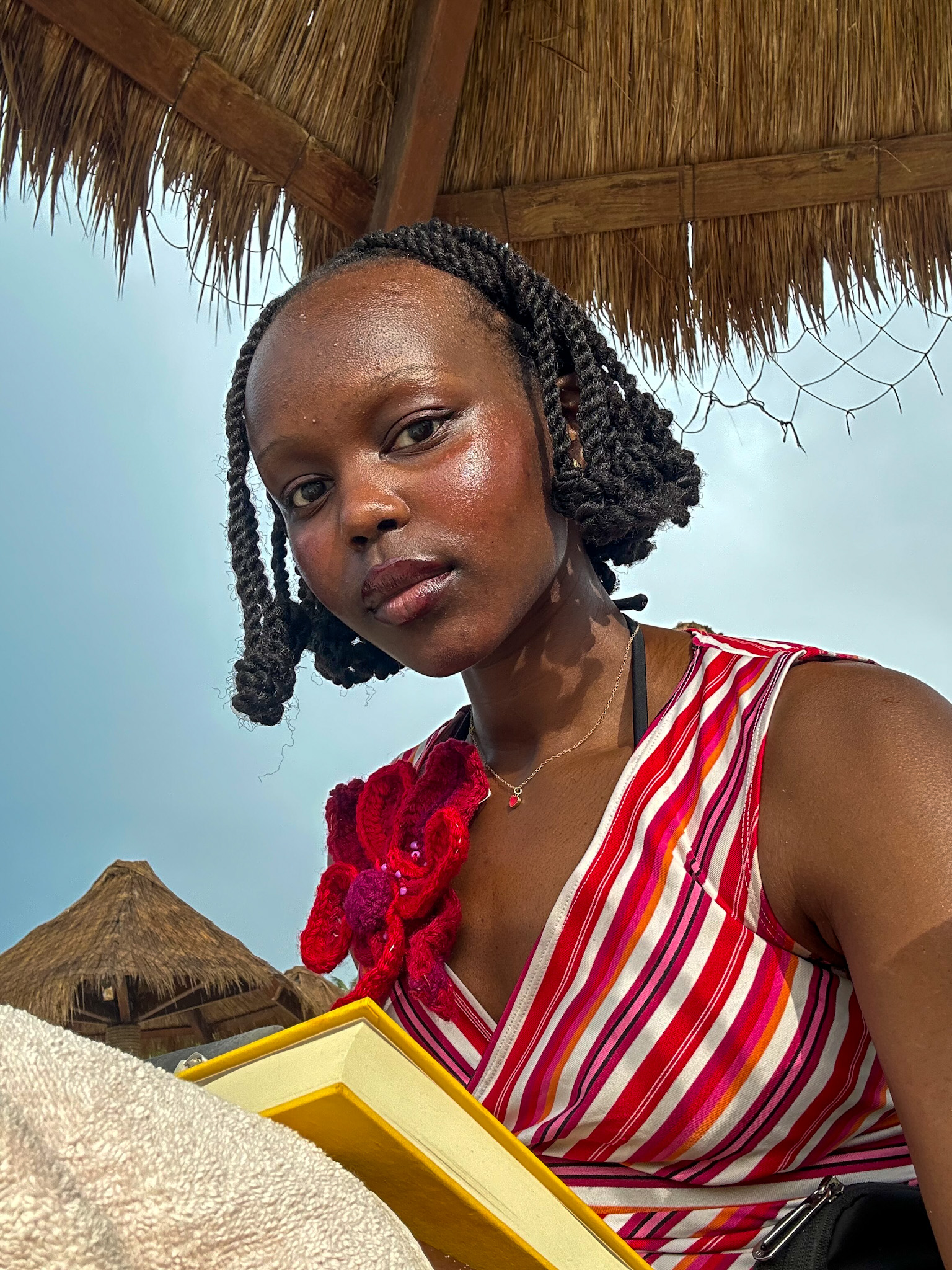 Author under cabana hut