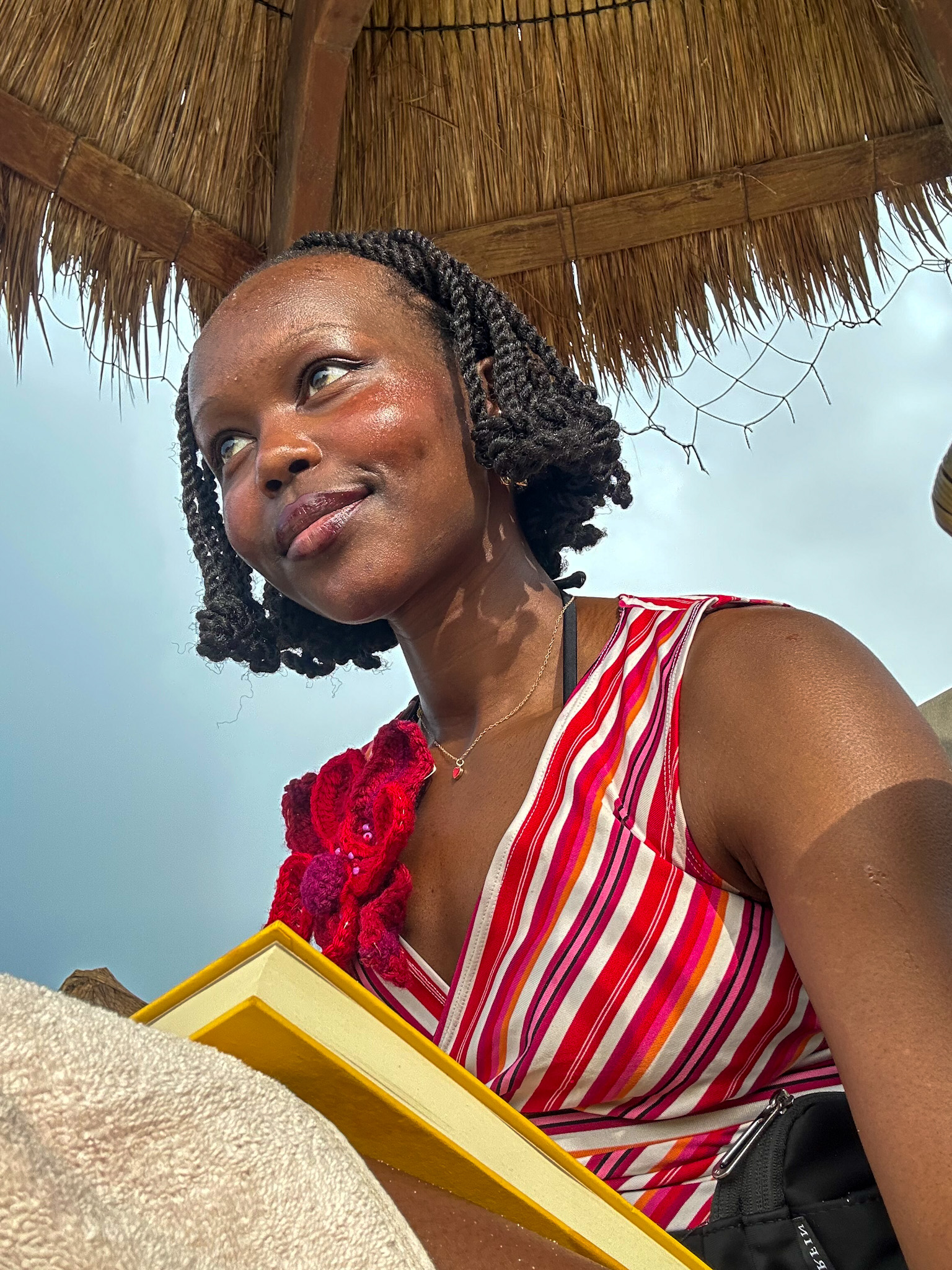 Smiling under cabana hut