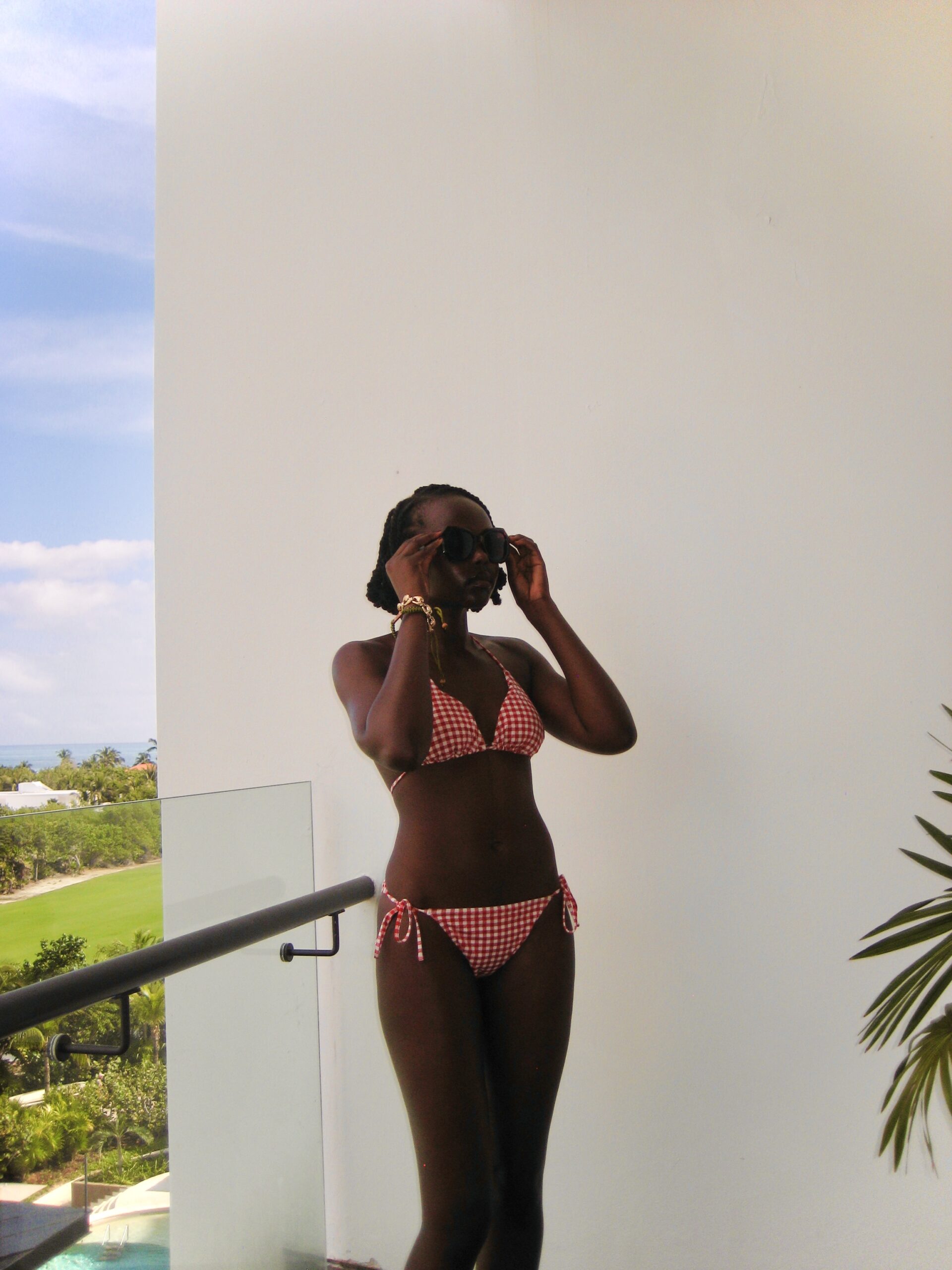 Author with red and white swimsuit