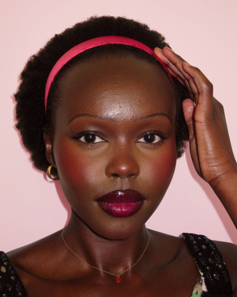 Yar Sudani posing in a full makeup beat